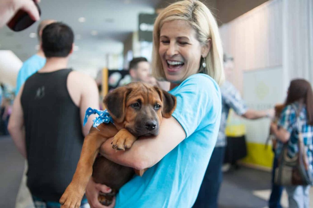 Woman holding a dog